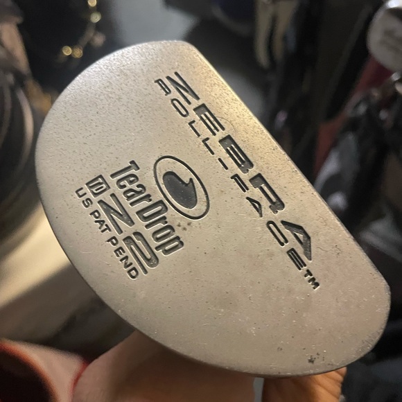 Zebra roll face golf putter in right hand - Picture 2 of 7